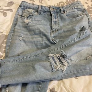 Ripped light washed skinny Wax Jeans